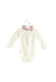 A White Long Sleeve Bodysuits from Dior in size 6-12M for girl. (Front View)