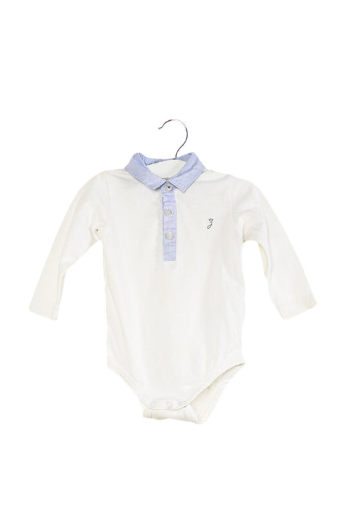 A White Long Sleeve Bodysuits from Jacadi in size 6-12M for boy. (Front View)