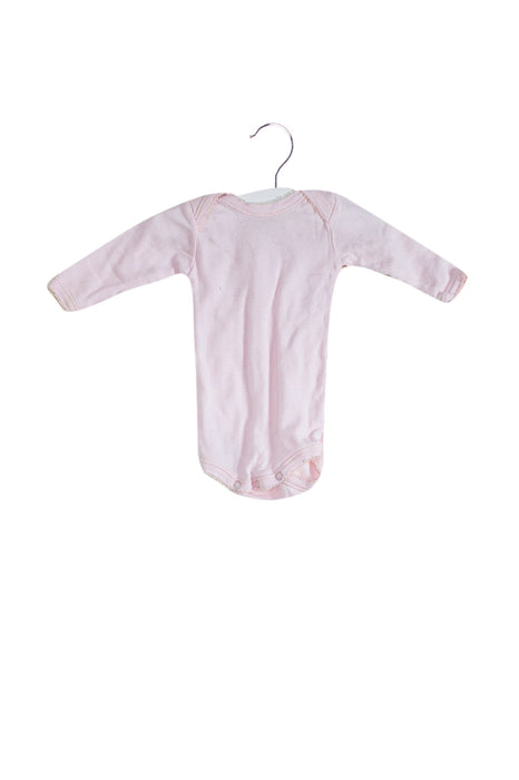 A Pink Long Sleeve Bodysuits from Petit Bateau in size 0-3M for girl. (Front View)