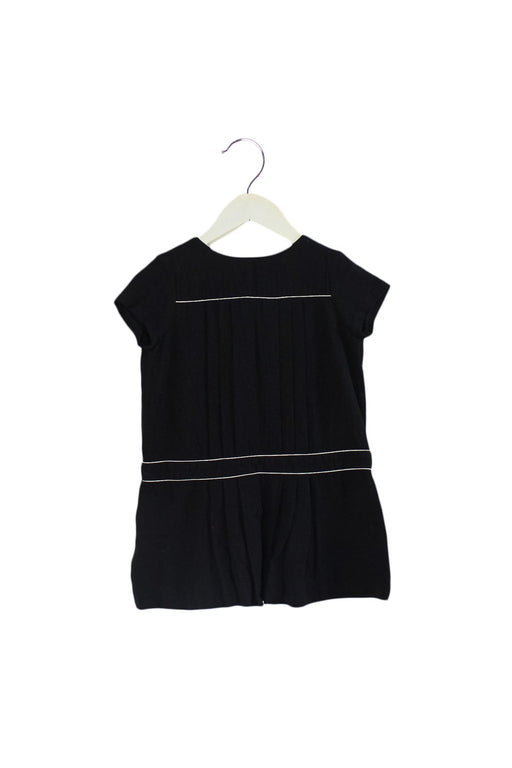 A Black Short Sleeve Tops from Bonpoint in size 6T for girl. (Front View)