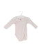 A Pink Long Sleeve Bodysuits from Petit Bateau in size 0-3M for girl. (Front View)