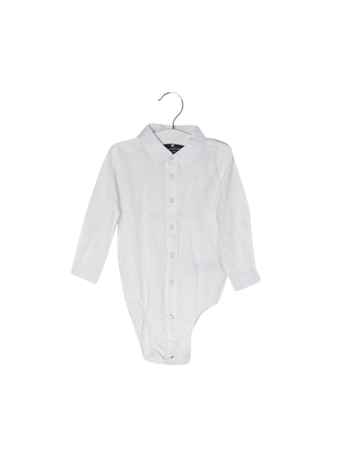 A White Long Sleeve Bodysuits from babycottons. in size 6-12M for neutral. (Front View)