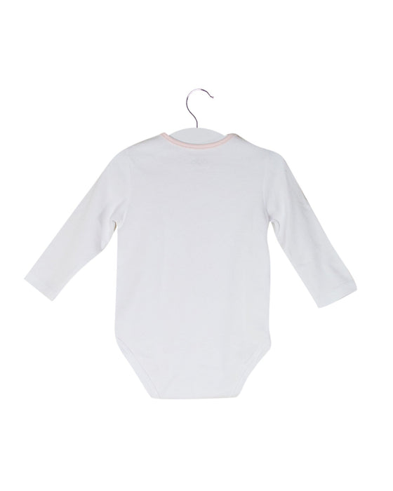 A White Long Sleeve Bodysuits from Mides in size 3-6M for girl. (Back View)