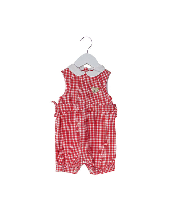 A Red Sleeveless Rompers from Steiff in size 3-6M for girl. (Front View)