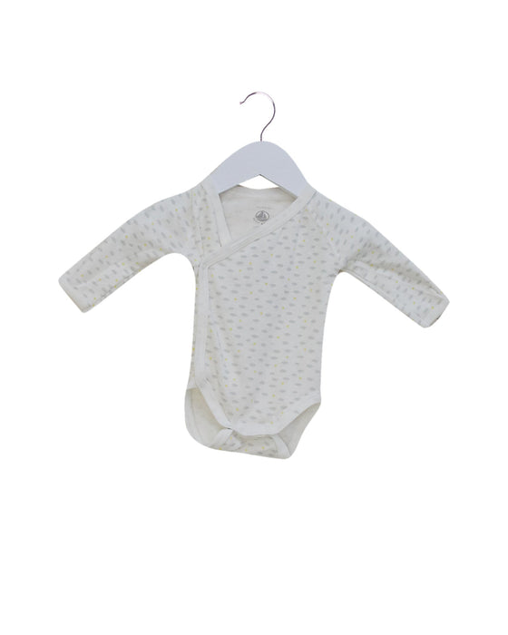 A Ivory Long Sleeve Bodysuits from Petit Bateau in size 0-3M for neutral. (Front View)