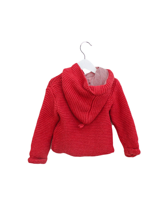 A Red Lightweight Jackets from Cyrillus in size 12-18M for girl. (Back View)