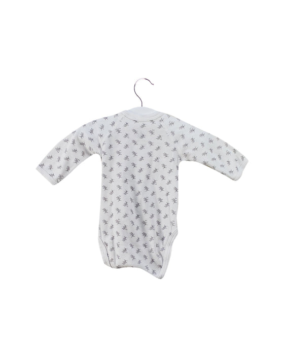 A White Long Sleeve Bodysuits from Petit Bateau in size 0-3M for neutral. (Back View)