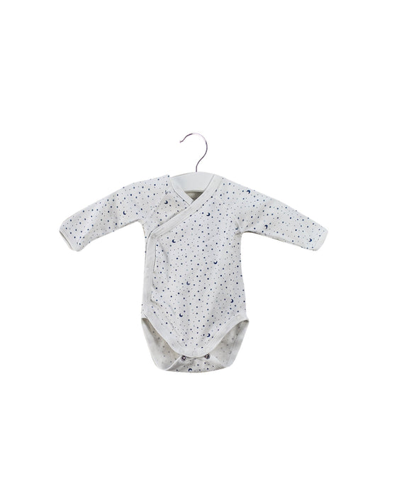 A White Long Sleeve Bodysuits from Petit Bateau in size 0-3M for boy. (Front View)