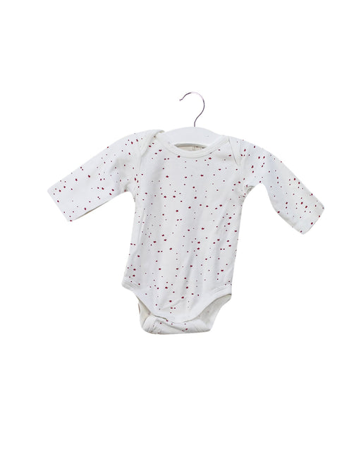 A White Long Sleeve Bodysuits from Purebaby in size 0-3M for girl. (Front View)