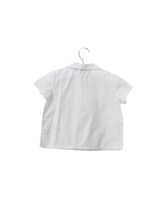 A White Shirts from Amaia in size 6-12M for girl. (Back View)