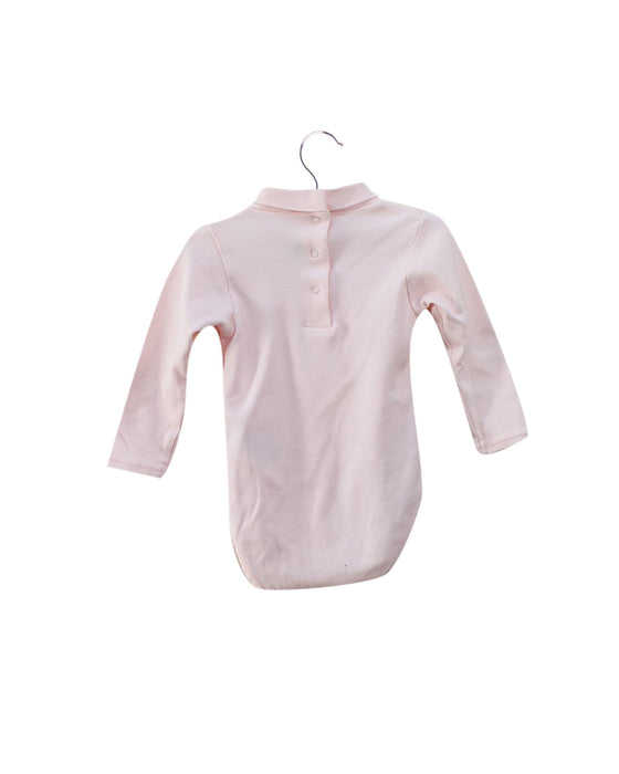 A Pink Long Sleeve Bodysuits from Dior in size 3-6M for girl. (Back View)