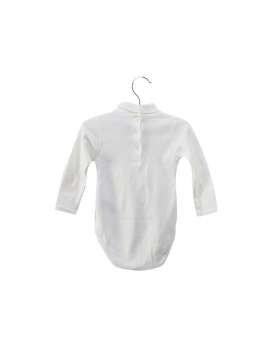 A White Long Sleeve Bodysuits from Dior in size 3-6M for girl. (Back View)