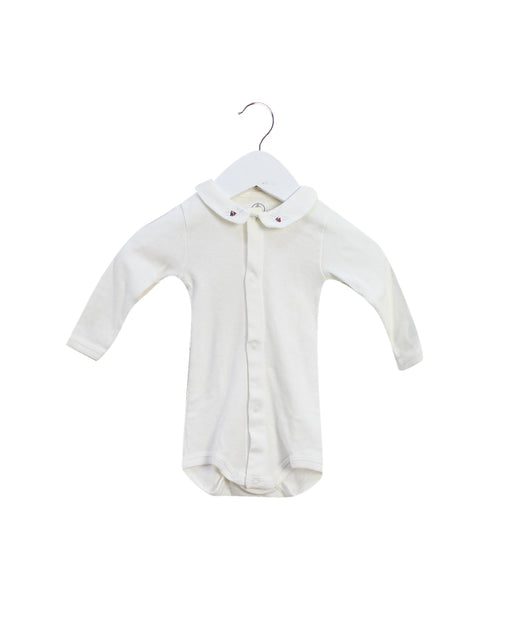 A White Long Sleeve Bodysuits from Petit Bateau in size 0-3M for girl. (Front View)