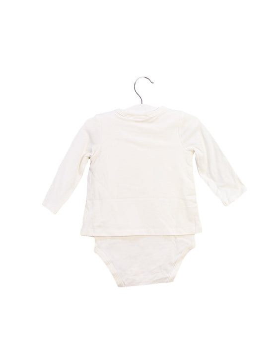 A Ivory Long Sleeve Bodysuits from Seed in size 3-6M for girl. (Back View)