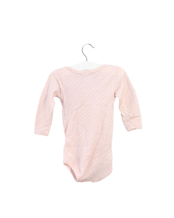 A Pink Long Sleeve Bodysuits from Petit Bateau in size 12-18M for girl. (Back View)