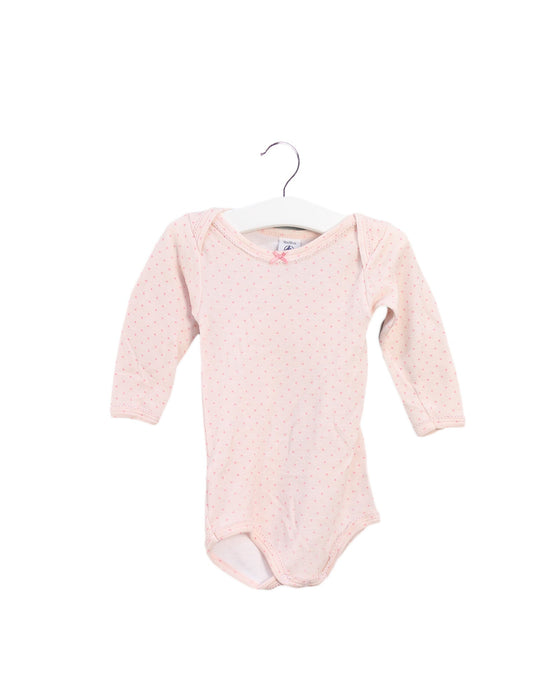 A Pink Long Sleeve Bodysuits from Petit Bateau in size 12-18M for girl. (Front View)