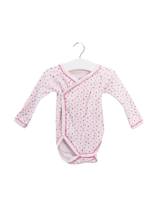 A Pink Long Sleeve Bodysuits from Petit Bateau in size 3-6M for girl. (Front View)