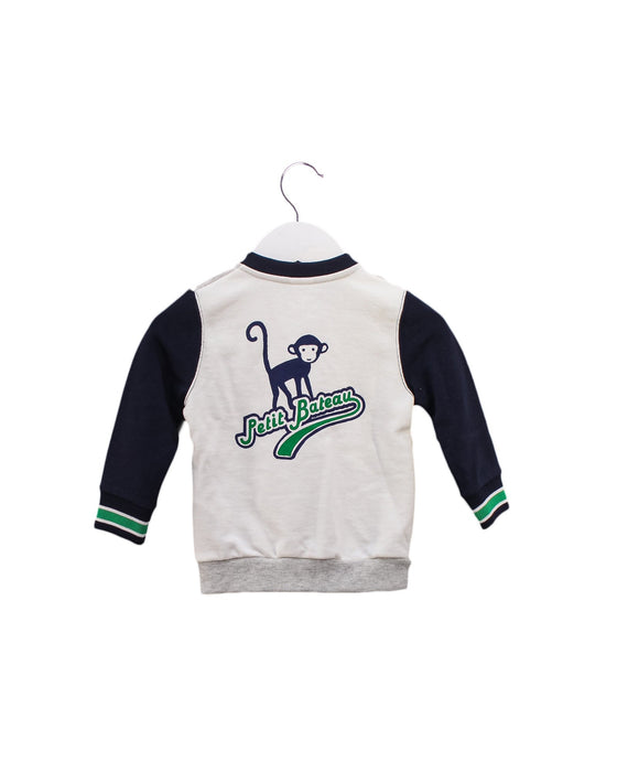 A Grey Lightweight Jackets from Petit Bateau in size 6-12M for boy. (Back View)