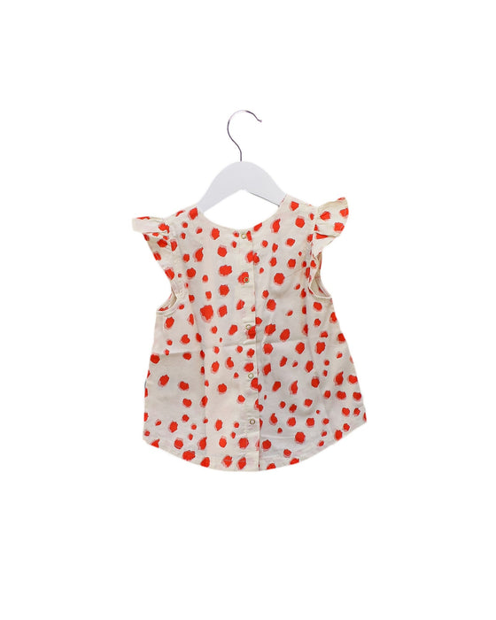 A Red Sleeveless Tops from Mini Rodini in size 5T for girl. (Back View)