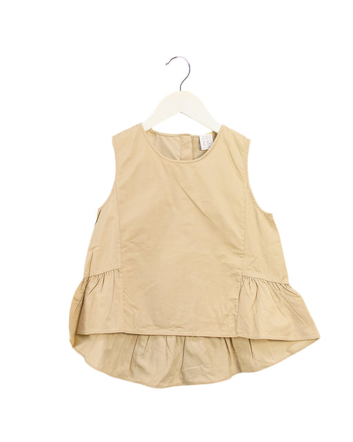 A Beige Sleeveless Tops from COS in size 6T for girl. (Front View)