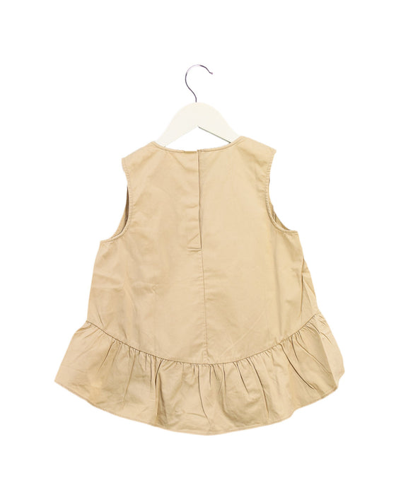 A Beige Sleeveless Tops from COS in size 6T for girl. (Back View)