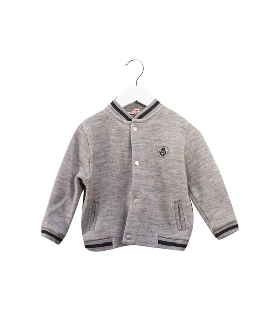 A Grey Lightweight Jackets from Bonpoint in size 3T for girl. (Front View)