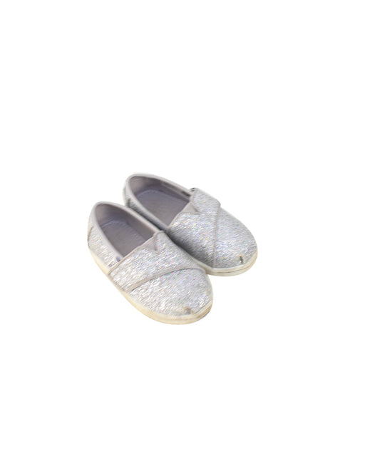 A Metallic Slip Ons from Toms in size EU22 for girl. (Front View)