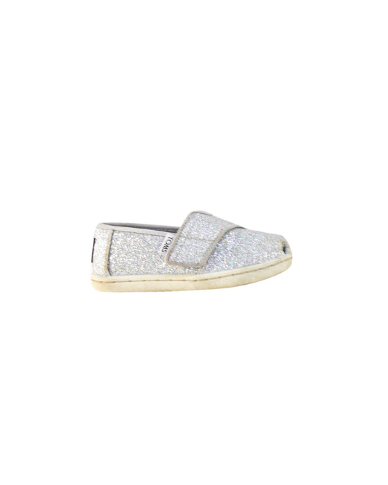 A Metallic Slip Ons from Toms in size EU22 for girl. (Back View)