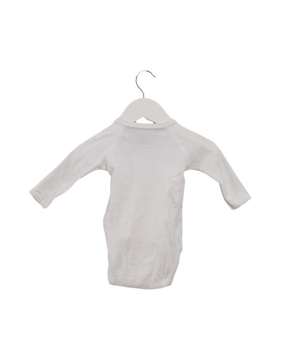 A Ivory Long Sleeve Bodysuits from Petit Bateau in size 0-3M for girl. (Back View)