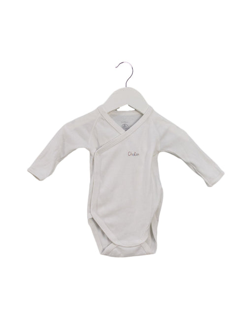 A Ivory Long Sleeve Bodysuits from Petit Bateau in size 0-3M for girl. (Front View)