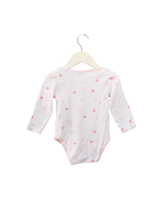 A White Long Sleeve Bodysuits from DPAM in size 12-18M for girl. (Back View)