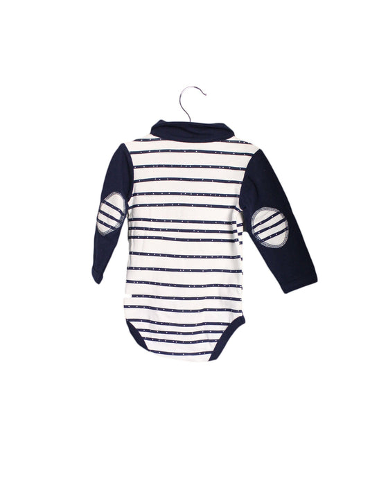 A Navy Long Sleeve Bodysuits from TinyBitz in size 6-12M for boy. (Back View)