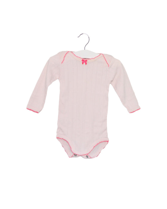 A Pink Long Sleeve Bodysuits from Petit Bateau in size 3-6M for girl. (Front View)