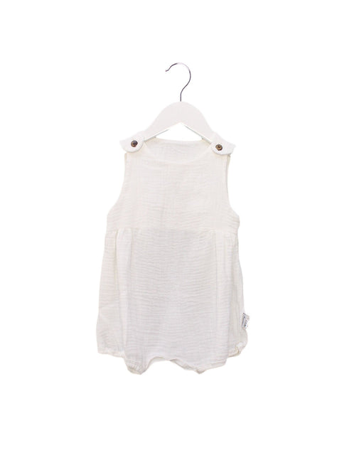A White Sleeveless Bodysuits from Cotton Pigs in size 6-12M for girl. (Front View)
