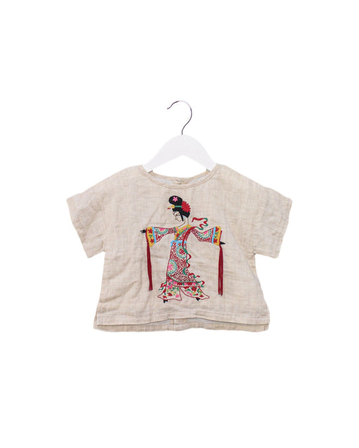 A Beige Short Sleeve Tops from Baby Shelter in size 12-18M for girl. (Front View)