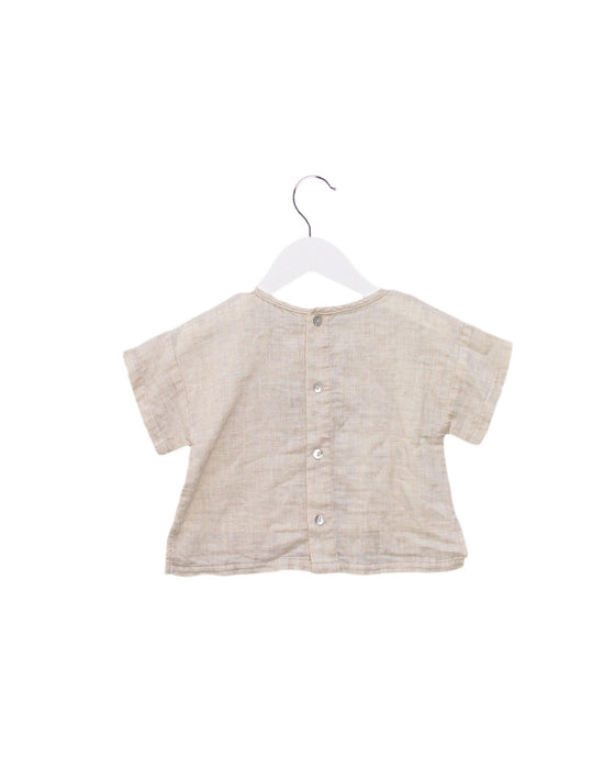A Beige Short Sleeve Tops from Baby Shelter in size 12-18M for girl. (Back View)