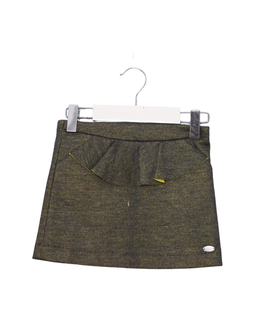 A Green Short Skirts from Tartine et Chocolat in size 4T for girl. (Front View)