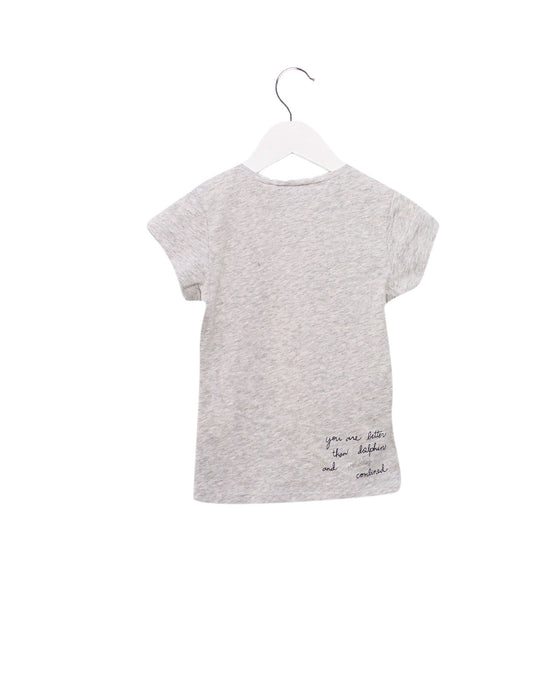 A Grey Short Sleeve T Shirts from IKKS in size 2T for girl. (Back View)