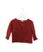 A Red Cardigans from Les Enfantines in size 6-12M for girl. (Front View)