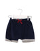 A Navy Shorts from Les Enfantines in size 12-18M for girl. (Front View)