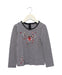 A Black Long Sleeve Tops from IKKS in size 6T for girl. (Front View)