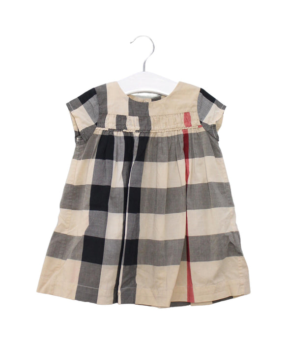 A Beige Short Sleeve Dresses from Burberry in size 6-12M for girl. (Front View)