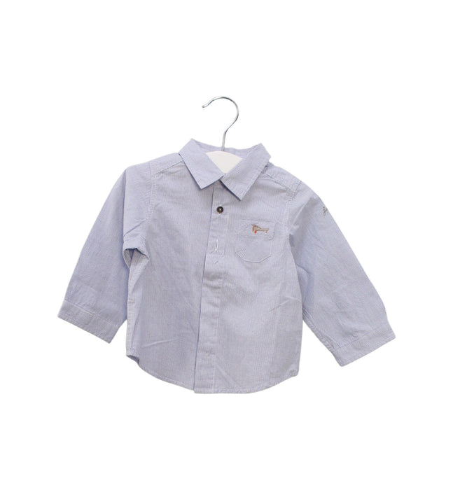 A Blue Shirts from Jacadi in size 6-12M for boy. (Front View)