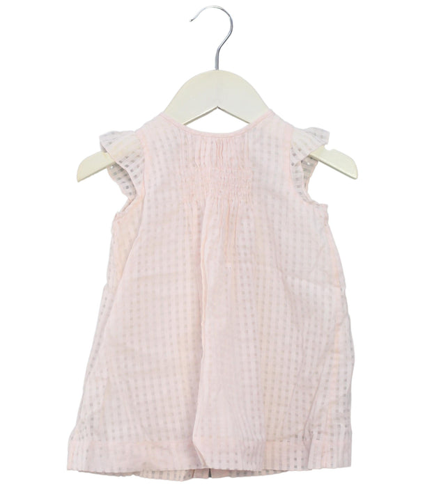A Pink Sleeveless Dresses from Bonpoint in size 6-12M for girl. (Front View)