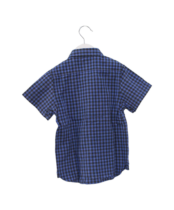 A Blue Shirts from Burberry in size 4T for boy. (Back View)