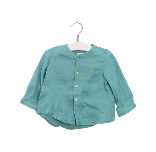 A Teal Shirts from Nanos in size 6-12M for boy. (Front View)