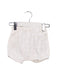 A White Bloomers from Bout'Chou in size 0-3M for girl. (Front View)