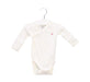 A Ivory Long Sleeve Bodysuits from Petit Bateau in size 0-3M for boy. (Front View)