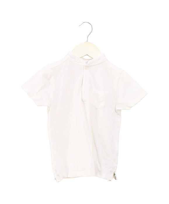 A White Short Sleeve Polos from Bonpoint in size 4T for boy. (Front View)