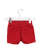 A Red Shorts from Levi's in size 3-6M for girl. (Back View)